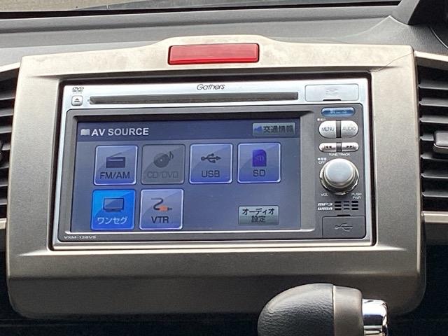 フリードスパイクハイブリッド ジャストセレクション ETC/純正ナビ/バックモニター Sキー キーフリー セキュリティーアラーム 横滑り防止機能 DVD視聴 後カメラ ワンセグTV ナビTV エアコン 両側スライド片側電動 パワーステアリング ABS(11枚目)
