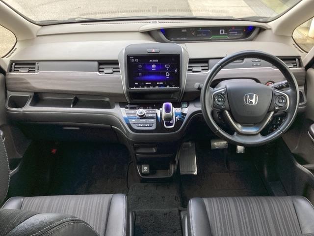 フリードハイブリッド ハイブリッド・ＥＸ　地デジフルセグＴＶ　シ－トヒ－タ－　整備記録簿　リヤカメラ　ＬＥＤライト　フルオートエアコン　ＡＢＳ　ＤＶＤ再生可　ウォークスルー　サイドエアバッグ　キーフリー　ナビ＆ＴＶ　アイドリングストップ（2枚目）