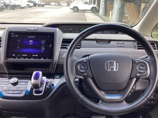 フリードハイブリッド ハイブリッド・ＥＸ　地デジフルセグＴＶ　シ－トヒ－タ－　整備記録簿　リヤカメラ　ＬＥＤライト　フルオートエアコン　ＡＢＳ　ＤＶＤ再生可　ウォークスルー　サイドエアバッグ　キーフリー　ナビ＆ＴＶ　アイドリングストップ（3枚目）