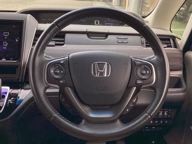 フリードハイブリッド ハイブリッド・ＥＸ　地デジフルセグＴＶ　シ－トヒ－タ－　整備記録簿　リヤカメラ　ＬＥＤライト　フルオートエアコン　ＡＢＳ　ＤＶＤ再生可　ウォークスルー　サイドエアバッグ　キーフリー　ナビ＆ＴＶ　アイドリングストップ（15枚目）