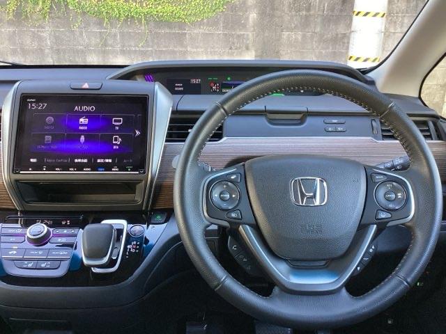 フリード＋ハイブリッド ハイブリッド・クロスター　ＥＴＣ／純正ナビ／バックモニター／ホンダセンシング／社外ドラレコ　シ－トヒ－タ－　Ｒカメラ　コーナーセンサー　ＶＳＡ　クルコン　ＬＥＤライト　サイドカーテンエアバック　フルセグＴＶ　フルオートエアコン（3枚目）