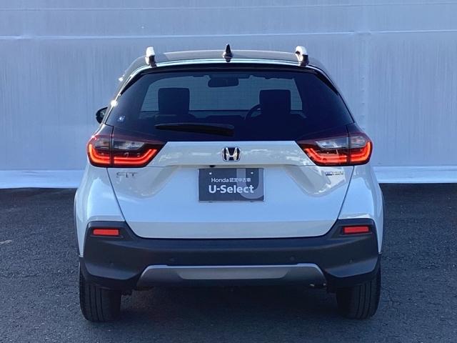 フィット ｅ：ＨＥＶクロスター　メモリーナビ　リアカメラ　ＥＴＣ　衝突回避システム　フルオートエアコン　整備記録簿　ＬＥＤランプ　エアバッグ　サイドエアバック　地デジ　オートクルーズコントロール　ＶＳＡ　バックカメラ　ＵＳＢ　ＡＢＳ（10枚目）