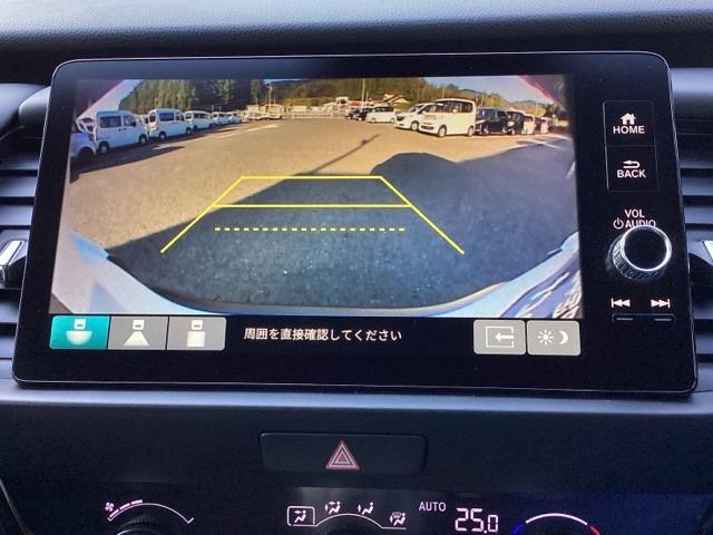 フィット ｅ：ＨＥＶクロスター　メモリーナビ　リアカメラ　ＥＴＣ　衝突回避システム　フルオートエアコン　整備記録簿　ＬＥＤランプ　エアバッグ　サイドエアバック　地デジ　オートクルーズコントロール　ＶＳＡ　バックカメラ　ＵＳＢ　ＡＢＳ（12枚目）