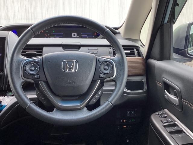 フリードハイブリッド ハイブリッド・クロスターホンダセンシング　メモリーナビ　ドラレコ　ＥＴＣ　リアカメラ　両側Ｐスライドドア　ＵＳＢ　オートクルーズコントロール　記録簿　ＤＶＤ再生可能　ＬＥＤライト　ＡＢＳ　盗難防止　シ－トヒ－タ－　スマ－トキ－　ＶＳＡ（3枚目）