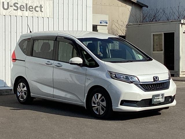 フリードハイブリッド ハイブリッド・Ｇホンダセンシング　ＥＴＣ／純正ナビ／バックモニター／ホンダセンシング　スマキ－　両Ｐスラドア　前後ソナー　Ｄレコ　Ａクルコン　ＬＥＤヘットランプ　整備記録簿　ナビＴＶ　Ｂカメラ　フルセグ地デジ　アイストップ　ＤＶＤ再生（7枚目）