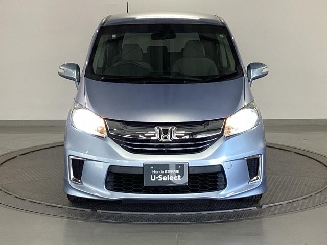 フリードハイブリッド ジャストセレクション　純正メモリーナビ　両側電動スライドドア　スマキー　イモビ　横滑り防止システム　１セグ　両電動スライドドア　ＤＶＤ再生可　ナビＴＶ　運転席エアバッグ　キーレスエントリーシステム　ＡＵＴＯエアコン　ＡＢＳ（6枚目）