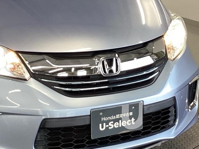 フリードハイブリッド ジャストセレクション　純正メモリーナビ　両側電動スライドドア　スマキー　イモビ　横滑り防止システム　１セグ　両電動スライドドア　ＤＶＤ再生可　ナビＴＶ　運転席エアバッグ　キーレスエントリーシステム　ＡＵＴＯエアコン　ＡＢＳ（24枚目）