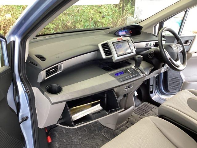 フリードハイブリッド ジャストセレクション　純正メモリーナビ　両側電動スライドドア　スマキー　イモビ　横滑り防止システム　１セグ　両電動スライドドア　ＤＶＤ再生可　ナビＴＶ　運転席エアバッグ　キーレスエントリーシステム　ＡＵＴＯエアコン　ＡＢＳ（35枚目）