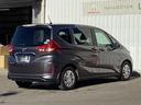 フリード＋ Ｇ・ホンダセンシング　スマートキーシステム　衝突被害軽減装置　Ａストップ　ＰＷ　後カメラ　パワーステアリング　ＤＶＤ再生　横滑り防止装置　イモビライザー　オートクルーズコントロール　ＥＴＣ車載器（8枚目）