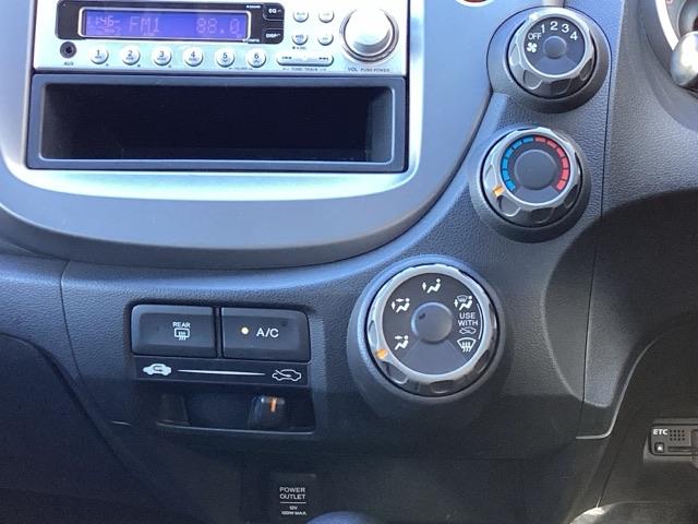 フィット Ｇスマートセレクション　ＦパッケージＨｏｎｄａスマートキーシステム　エアバック　Ｗエアーバック　記録簿　イモビライザー　パワーウィンドウ　ＡＢＳ　パワステ　ＥＴＣ　エアコン　キーレス　スマートキープッシュスタート（22枚目）