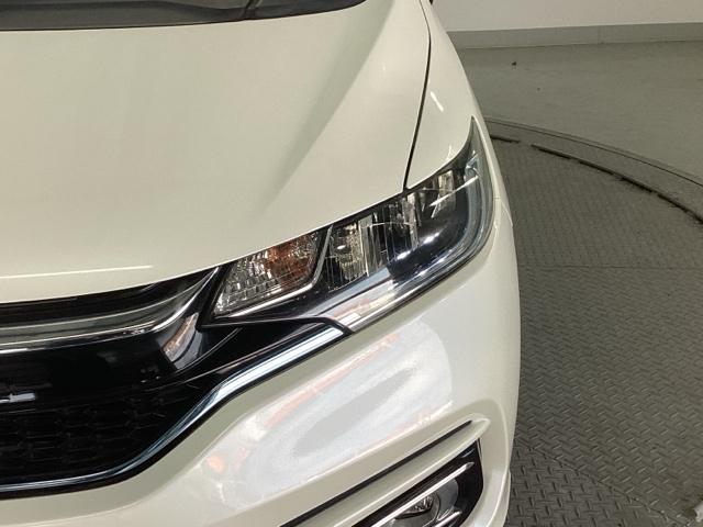 フィットハイブリッド Ｌホンダセンシング　純正ナビ　スマートキー　ドラレコ　ヘッドライトＬＥＤ　セキュリティアラーム　運転席エアバッグ　横滑り防止機能　サイドエアバッグ　Ｒカメ　キーレス　オートクルーズ　ＥＴＣ車載器　Ａストップ　ＡＢＳ（27枚目）