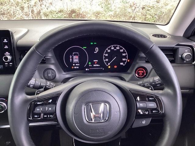 ヴェゼル e:HEVZ ドラレコ ナビ Rカメラ ブルートゥース Sヒータ 地デジフルセグTV 定期点検記録簿 電動テールゲート サイドエアバッグ 後カメラ 前後障害物センサー 横滑防止装置 エアコン LEDヘットライト(25枚目)