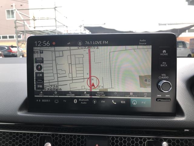 シビック ＬＸ　登録済未使用車　クルコン　リアカメラ　横滑り防止装置　禁煙車　１オーナー　ソナー　ターボ車　シートヒーター　オートエアコン　サイドエアバッグ　パワーウィンドウ　ＡＢＳ　スマートキー　エアバッグ　地デジ（5枚目）