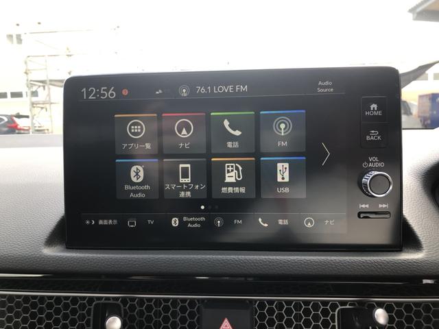 シビック ＬＸ　登録済未使用車　クルコン　リアカメラ　横滑り防止装置　禁煙車　１オーナー　ソナー　ターボ車　シートヒーター　オートエアコン　サイドエアバッグ　パワーウィンドウ　ＡＢＳ　スマートキー　エアバッグ　地デジ（6枚目）