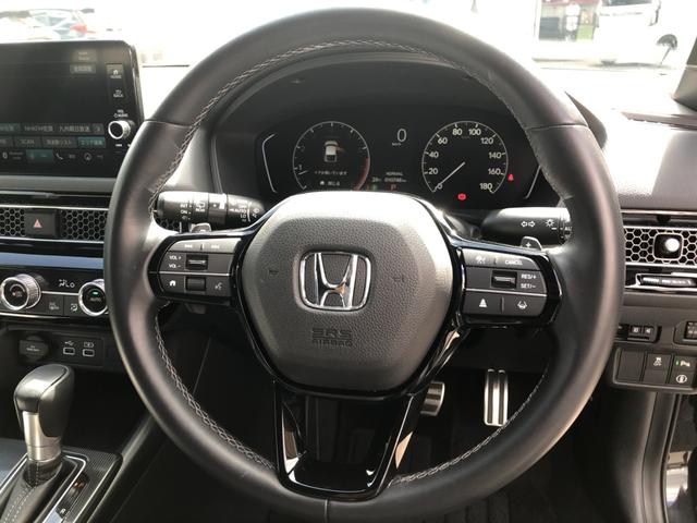 シビック ＬＸ　登録済未使用車　クルコン　リアカメラ　横滑り防止装置　禁煙車　１オーナー　ソナー　ターボ車　シートヒーター　オートエアコン　サイドエアバッグ　パワーウィンドウ　ＡＢＳ　スマートキー　エアバッグ　地デジ（9枚目）