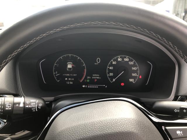 シビック ＬＸ　登録済未使用車　クルコン　リアカメラ　横滑り防止装置　禁煙車　１オーナー　ソナー　ターボ車　シートヒーター　オートエアコン　サイドエアバッグ　パワーウィンドウ　ＡＢＳ　スマートキー　エアバッグ　地デジ（10枚目）