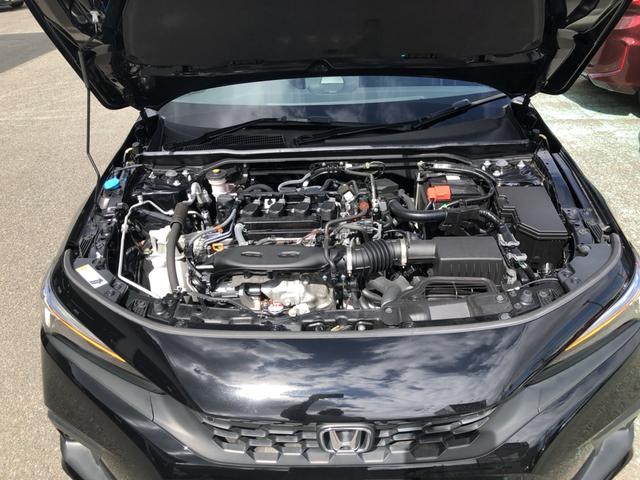 シビック ＬＸ　登録済未使用車　クルコン　リアカメラ　横滑り防止装置　禁煙車　１オーナー　ソナー　ターボ車　シートヒーター　オートエアコン　サイドエアバッグ　パワーウィンドウ　ＡＢＳ　スマートキー　エアバッグ　地デジ（34枚目）