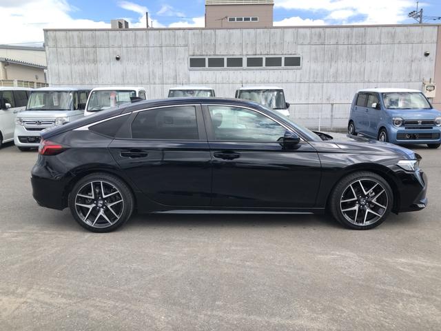 シビック ＬＸ　登録済未使用車　クルコン　リアカメラ　横滑り防止装置　禁煙車　１オーナー　ソナー　ターボ車　シートヒーター　オートエアコン　サイドエアバッグ　パワーウィンドウ　ＡＢＳ　スマートキー　エアバッグ　地デジ（37枚目）