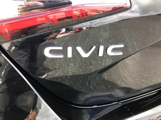 シビック ＬＸ　登録済未使用車　クルコン　リアカメラ　横滑り防止装置　禁煙車　１オーナー　ソナー　ターボ車　シートヒーター　オートエアコン　サイドエアバッグ　パワーウィンドウ　ＡＢＳ　スマートキー　エアバッグ　地デジ（51枚目）