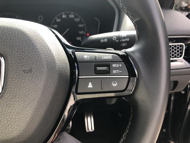 シビック ＬＸ　登録済未使用車　クルコン　リアカメラ　横滑り防止装置　禁煙車　１オーナー　ソナー　ターボ車　シートヒーター　オートエアコン　サイドエアバッグ　パワーウィンドウ　ＡＢＳ　スマートキー　エアバッグ　地デジ（56枚目）