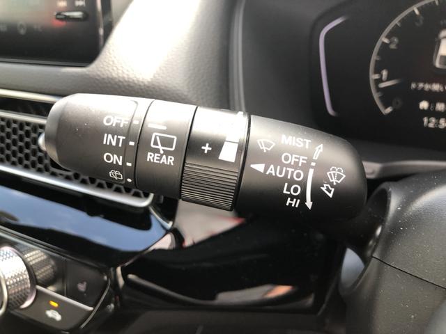 シビック ＬＸ　登録済未使用車　クルコン　リアカメラ　横滑り防止装置　禁煙車　１オーナー　ソナー　ターボ車　シートヒーター　オートエアコン　サイドエアバッグ　パワーウィンドウ　ＡＢＳ　スマートキー　エアバッグ　地デジ（57枚目）