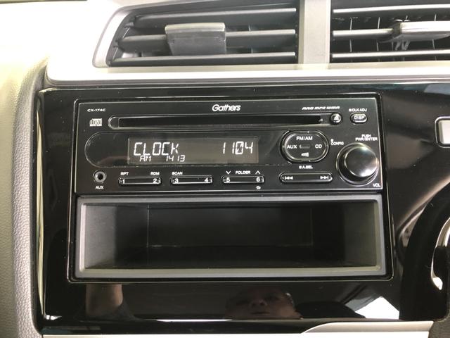 フィット １３Ｇ・Ｆ　ＣＤプレイヤー　ワンオーナー　禁煙車　スマートキー　記録簿　キーフリーシステム　両席エアバック　横滑り防止装置付　ＡＢＳ　スマートキ－　運転席エアバッグ　ＡＵＴＯエアコン　パワーウィンドー　パワステ（5枚目）
