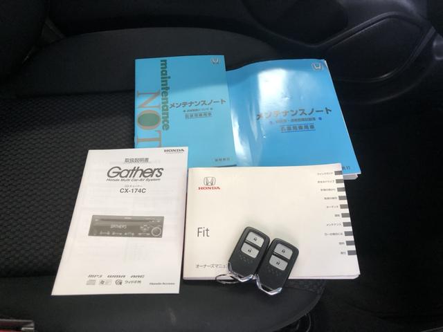 フィット １３Ｇ・Ｆ　ＣＤプレイヤー　ワンオーナー　禁煙車　スマートキー　記録簿　キーフリーシステム　両席エアバック　横滑り防止装置付　ＡＢＳ　スマートキ－　運転席エアバッグ　ＡＵＴＯエアコン　パワーウィンドー　パワステ（26枚目）