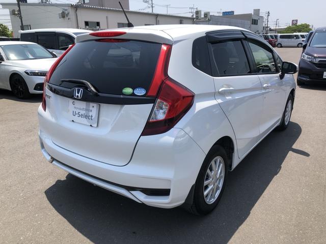 フィット １３Ｇ・Ｆ　ＣＤプレイヤー　ワンオーナー　禁煙車　スマートキー　記録簿　キーフリーシステム　両席エアバック　横滑り防止装置付　ＡＢＳ　スマートキ－　運転席エアバッグ　ＡＵＴＯエアコン　パワーウィンドー　パワステ（29枚目）