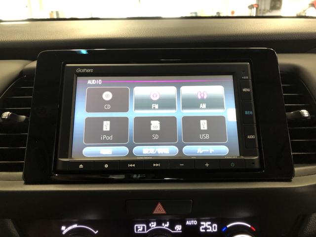 フィット ｅ：ＨＥＶホーム　純正ナビ　ＥＴＣ　前後ドラレコ　ＬＥＤ　ワンオーナー　禁煙車　前後ブレーキサポート　盗難防止　クリアランスソナー　ＥＣＯモード　１オーナー　バックガイドモニター　スマートキー　オートクルーズ　記録簿付（6枚目）