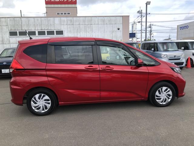 フリード Ｇ　試乗車アップ　純正ナビ　両側電動ドア　ＬＥＤ　シートヒーター　Ａクルーズ　記録簿　３列シート　パワーウインドウ　地デジ　Ｒカメラ　イモビ　禁煙　ＶＳＡ　ＵＳＢ　エアコン　エアバッグ　スマートキー（30枚目）