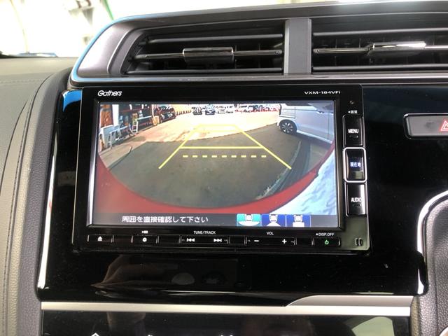 フィット １３Ｇ・Ｆコンフォートエディション　純正ナビ　ＥＴＣ　ＬＥＤ　ワンオーナー　禁煙車　記録簿　エアコン　リヤカメラ　横滑防止装置　衝突軽減　パワーウィンドウ　スマートキー　ＤＶＤ再生　ＡＢＳ　クルーズコントロール　Ｉストップ　ＵＳＢ（7枚目）
