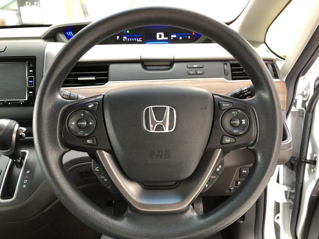 フリード＋ Ｇ・ホンダセンシング　純正ナビ　ＥＴＣ　前後ドラレコ　両側電動スライド　シートヒーター　クルーズコントロール　禁煙車　ワンオーナー　プリクラッシュ　Ｂモニター　両側オートスライドドア　パワーウインド　スマートキー　ＰＳ（9枚目）