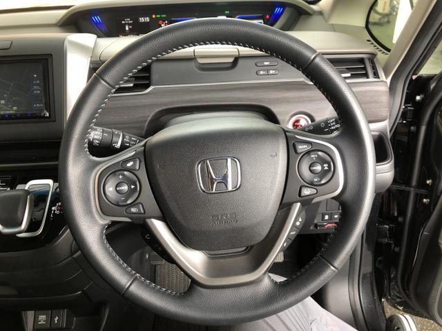 フリードハイブリッド ハイブリッド・Ｇ　レンタカーアップ　ナビ　ＥＴＣ　ドラレコ　両側電動スライド　シートヒーター　ＬＥＤ　禁煙車　両電動ドア　サイドエアバック　クルコン　スマキー　パワーステアリング　ウォークスルー　フルオートエアコン（11枚目）