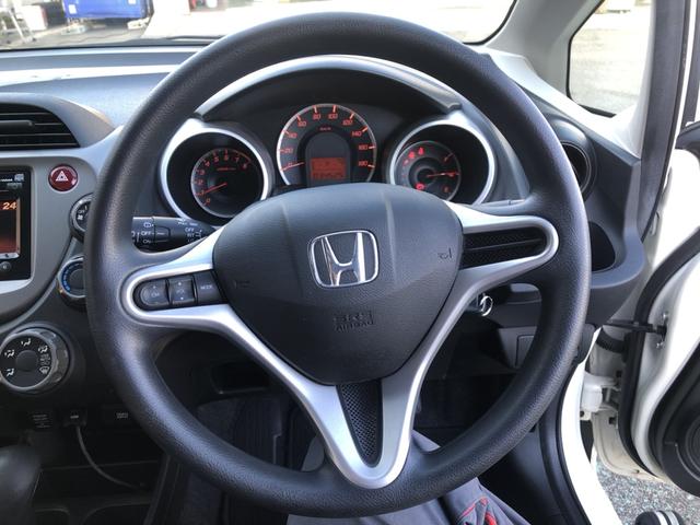 フィット Ｇ　純正ディスプレイオーディオ　バックカメラ　ワンオーナー　禁煙車　運転席助手席エアバッグ　Ｂモニター　キーレスリモコン　盗難防止システム　エアコン　ＡＢＳ　パワーウィンドウ　１オーナー　定期点検記録簿（5枚目）