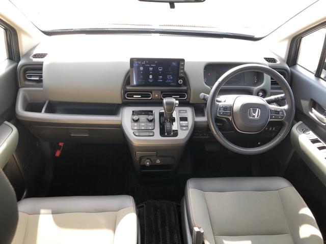 フリード e:HEVクロスター 試乗車アップ 純正ナビ ETC 前後ドラレコ 両側電動ドア LED アルミホイール Sヒーター 衝突軽減ブレーキシステム フルセグ 禁煙車 オートエアコン バックモニター パーキングセンサー キーレス(3枚目)