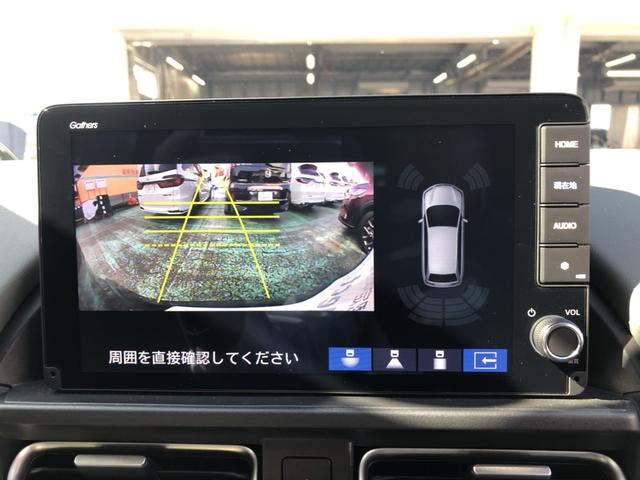 フリード e:HEVクロスター 試乗車アップ 純正ナビ ETC 前後ドラレコ 両側電動ドア LED アルミホイール Sヒーター 衝突軽減ブレーキシステム フルセグ 禁煙車 オートエアコン バックモニター パーキングセンサー キーレス(7枚目)