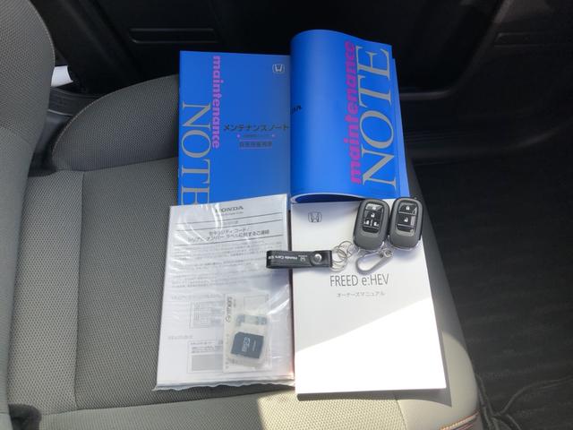 フリード e:HEVクロスター 試乗車アップ 純正ナビ ETC 前後ドラレコ 両側電動ドア LED アルミホイール Sヒーター 衝突軽減ブレーキシステム フルセグ 禁煙車 オートエアコン バックモニター パーキングセンサー キーレス(36枚目)