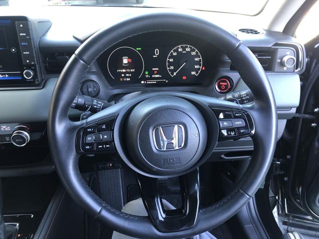 ヴェゼル ｅ：ＨＥＶＸ・ＨｕＮＴパッケージ　試乗車アップ　純正ナビ　ＥＴＣ　前後ドラレコ　ＬＥＤ　アルミホイール　盗難防止システム　地デジフルセグ　サイドエアバッグ　Ｂカメラ　クリアランスソナー　横滑り防止機能　スマートキー　禁煙　オートライト（11枚目）