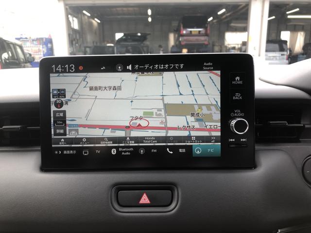 ヴェゼル ｅ：ＨＥＶＺ　試乗車アップ　純正ナビ　ＥＴＣ　ドラレコ　全周囲カメラ　クルーズコントロール　シートヒーター　禁煙車　衝突回避支援ブレーキ機能　パノラミックビューモニター　スマキ　Ｐトランク　フルオートエアコン（5枚目）