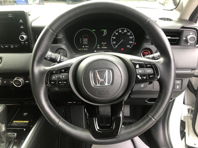 ヴェゼル ｅ：ＨＥＶＺ　試乗車アップ　純正ナビ　ＥＴＣ　ドラレコ　全周囲カメラ　クルーズコントロール　シートヒーター　禁煙車　衝突回避支援ブレーキ機能　パノラミックビューモニター　スマキ　Ｐトランク　フルオートエアコン（10枚目）