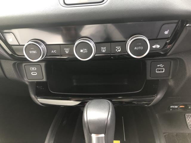 ヴェゼル ｅ：ＨＥＶＺ　試乗車アップ　純正ナビ　ＥＴＣ　ドラレコ　全周囲カメラ　クルーズコントロール　シートヒーター　禁煙車　衝突回避支援ブレーキ機能　パノラミックビューモニター　スマキ　Ｐトランク　フルオートエアコン（29枚目）