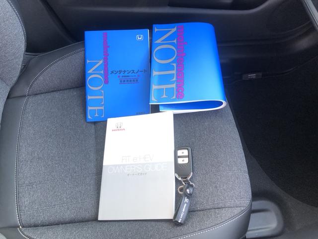 フィット ｅ：ＨＥＶホーム　試乗車アップ　純正ディスプレイオーディオ　ＬＥＤ　禁煙車　前後誤発進抑制機能　クリソナ　助手席エアバッグ　運転席エアバッグ　アイドリングストップ　ＵＳＢ接続　バックカメラ　ＡＢＳ　サイドエアバッグ（31枚目）