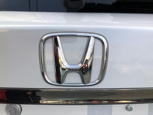 ヴェゼル ハイブリッドＺ・ホンダセンシング　純正ナビ　ＥＴＣ　ドラレコ　ＬＥＤ　アルミホイール　シートヒーター　レーダーサポート　１オーナ－　ＤＶＤ再生機能　整備記録簿　横滑り防止システム　バックアイカメラ　盗難防止装置　フルセ　スマ－トキ－（49枚目）