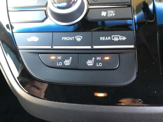 フリードハイブリッド ハイブリッド・Ｇ　純正ナビ　ＥＴＣ　両側電動ドア　シートヒーター　ＬＥＤ　アルミホイール　両電動ドア　サイドエアバック　クルコン　スマキー　パワーステアリング　オートライト　フルセグＴＶ　ウォークスルー　Ｂカメラ　禁煙（12枚目）