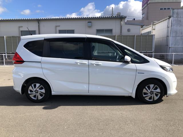 フリードハイブリッド ハイブリッド・Gホンダセンシング ナビ ETC 前後ドラレコ 両側電動ドア ホンダセンシング ワンオーナー 禁煙車 軽減ブレーキ キーフリーシステム 1オ-ナ- 記録簿 DVD再生可能 ECON 後カメラ Aクルーズ 横滑防止 USB(33枚目)