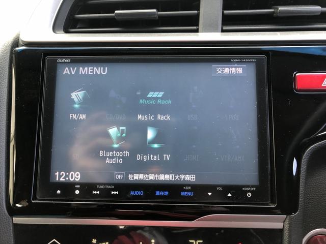 フィット １３Ｇ・Ｆパッケージ　純正ナビ　ドラレコ　ワンオーナー　禁煙車　イモビ　ＤＶＤ再生可能　スマ－トキ－　記録簿有り　ＶＳＡ　ＥＴＣ付き　地デジＴＶ　助手席エアバッグ　オートエアコン　エアバック　ＰＳ　キ－フリ－　Ｄレコ　ＰＷ（5枚目）