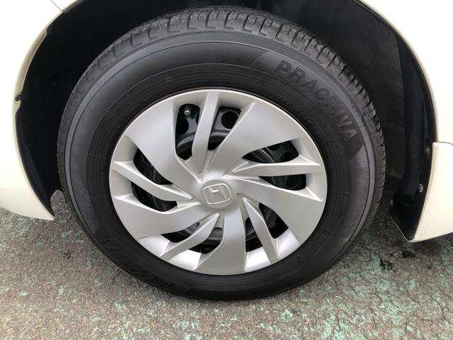 フィット １３Ｇ・Ｆパッケージ　純正ナビ　ドラレコ　ワンオーナー　禁煙車　イモビ　ＤＶＤ再生可能　スマ－トキ－　記録簿有り　ＶＳＡ　ＥＴＣ付き　地デジＴＶ　助手席エアバッグ　オートエアコン　エアバック　ＰＳ　キ－フリ－　Ｄレコ　ＰＷ（22枚目）