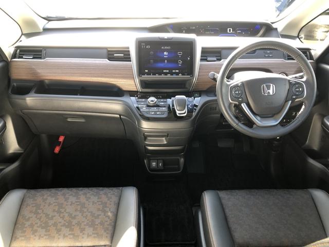 フリードハイブリッド ハイブリッド・クロスター　純正ナビ　ＥＴＣ　前後ドラレコ　両側電動ドア　ＬＥＤ　アルミホイール　ワンオーナー車　Ｗ電動ドア　オートクルーズコントロール　バックモニター　ナビＴＶ　禁煙　フルセグテレビ　シ－トヒ－タ－　エアバッグ（2枚目）