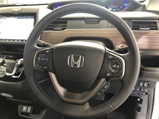 フリードハイブリッド ハイブリッド・クロスター　純正ナビ　ＥＴＣ　前後ドラレコ　両側電動ドア　ＬＥＤ　アルミホイール　ワンオーナー車　Ｗ電動ドア　オートクルーズコントロール　バックモニター　ナビＴＶ　禁煙　フルセグテレビ　シ－トヒ－タ－　エアバッグ（10枚目）