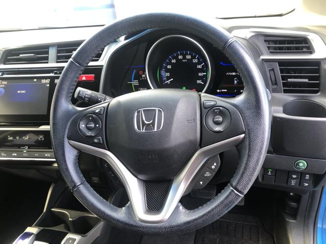 フィットハイブリッド Ｌパッケージ　純正ナビ　ＥＴＣ　ＬＥＤ　ワンオーナー　クルーズコントロール　カーテンエアバック　ワンオナ　ＥＣＯモード　助手席エアバック　エアコン　ＵＳＢポート　エアバック　Ｂカメラ　キーフリーキー　パワーステ（8枚目）